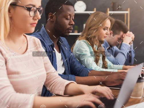 programmers-working-in-software-developing-PGV86YJ